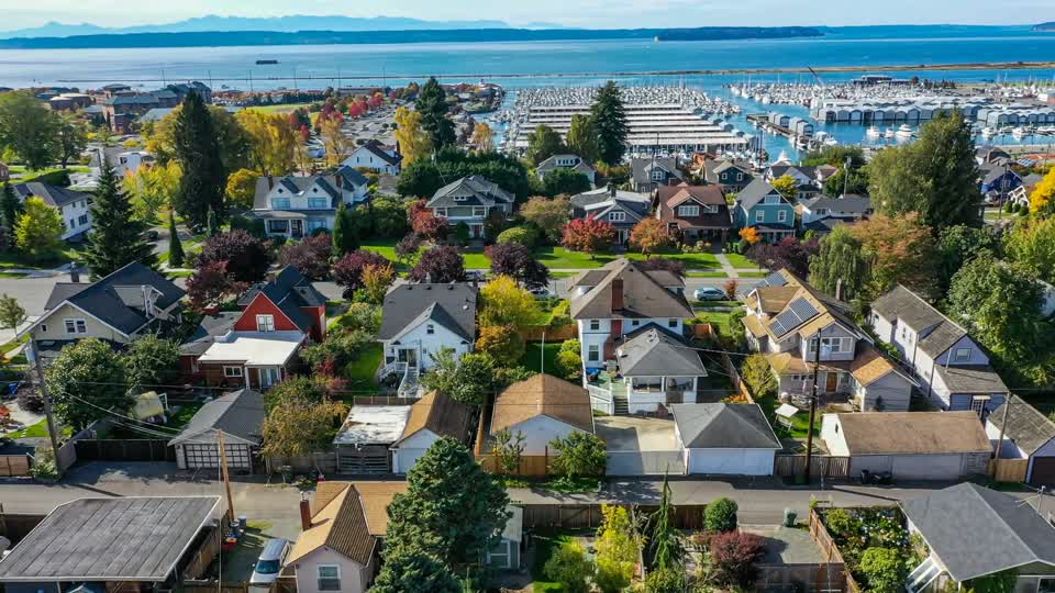 Aerial view of a coastal neighborhood and marina